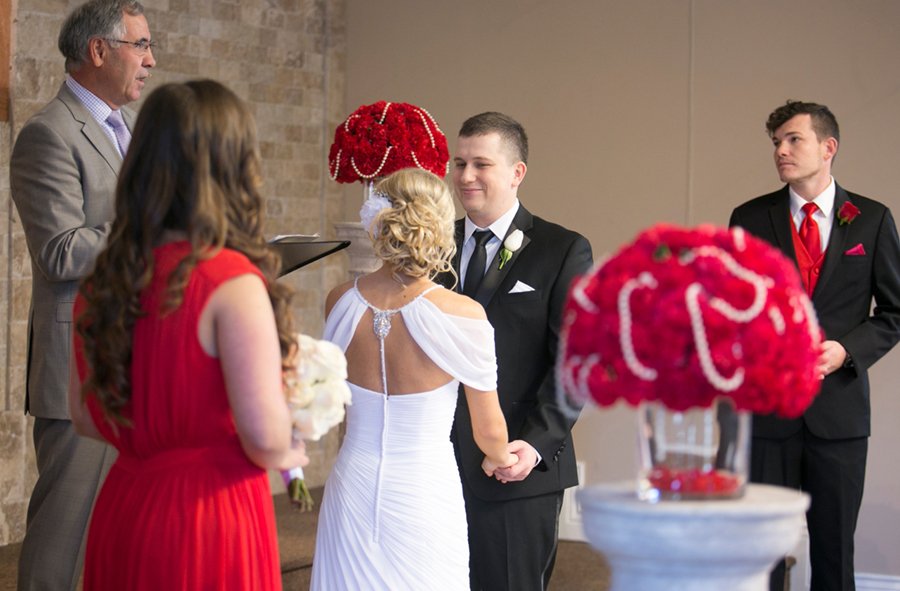 Golden Gates Wedding, Philadelphia Wedding, Heidi Roland Photography, church ceremony, red flower, flower petals 