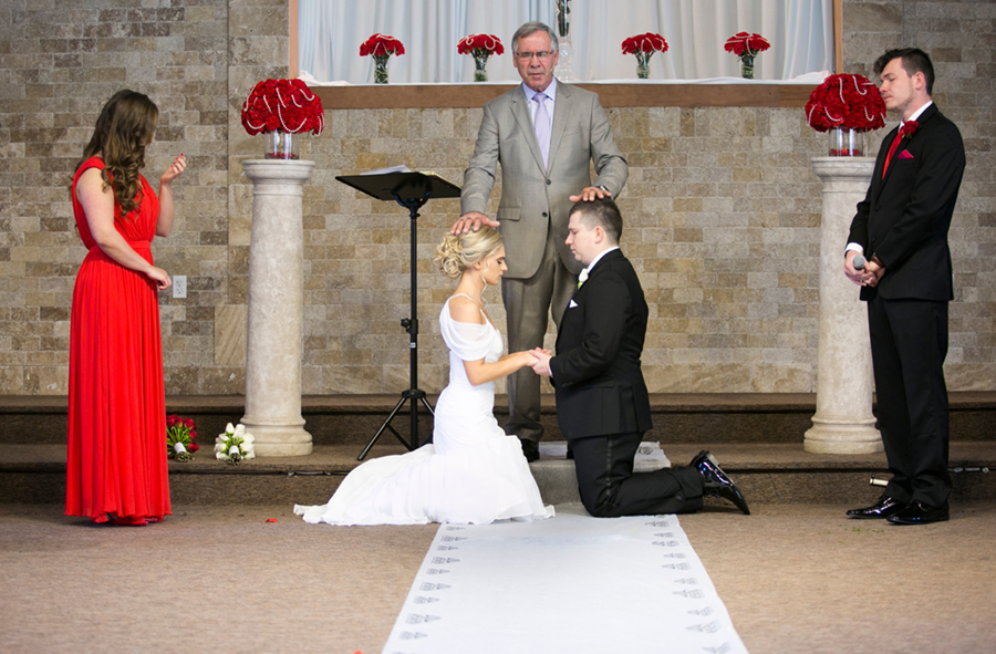 Golden Gates Wedding, Philadelphia Wedding, Heidi Roland Photography, church ceremony, red flower, flower petals, blessing