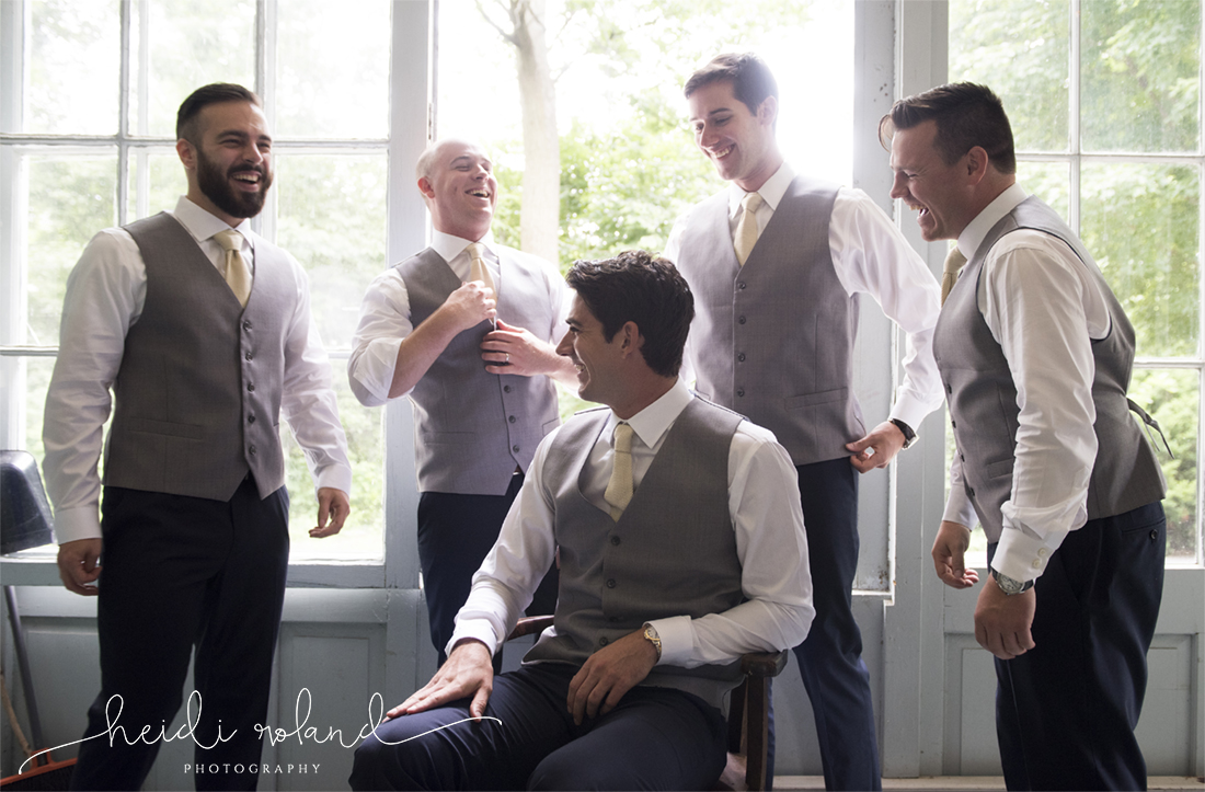 awbury arboretum wedding, groom laughing with his groomsmen