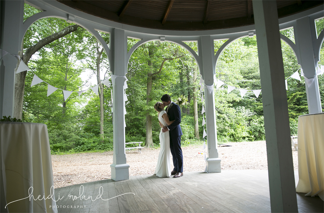 awbury arboretum wedding, bride and groom kiss