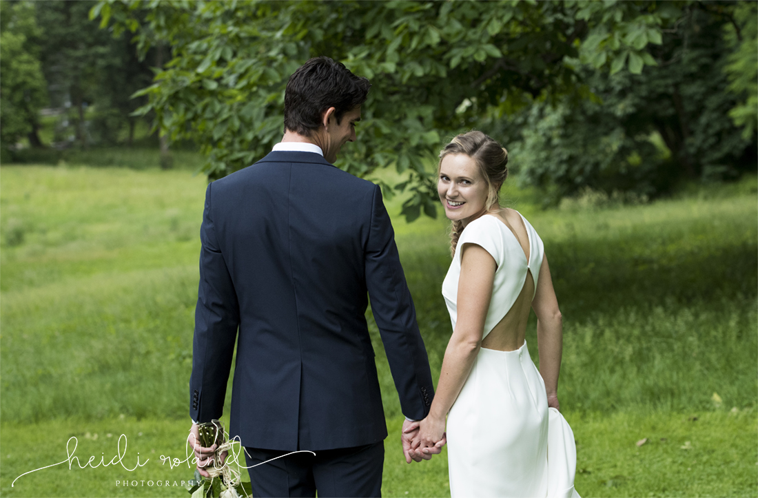 awbury arboretum wedding, bride and groom in field