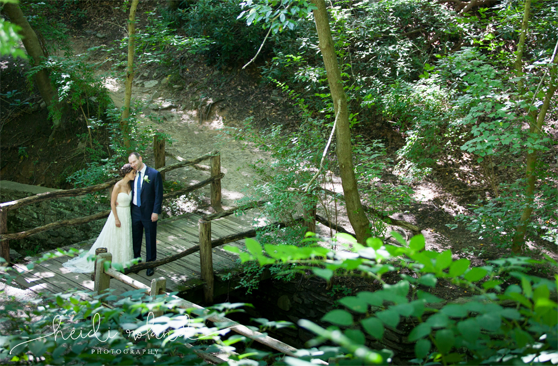 Valley Green Inn Wedding, bride and groom on bridge in the woods wissahickon valley park