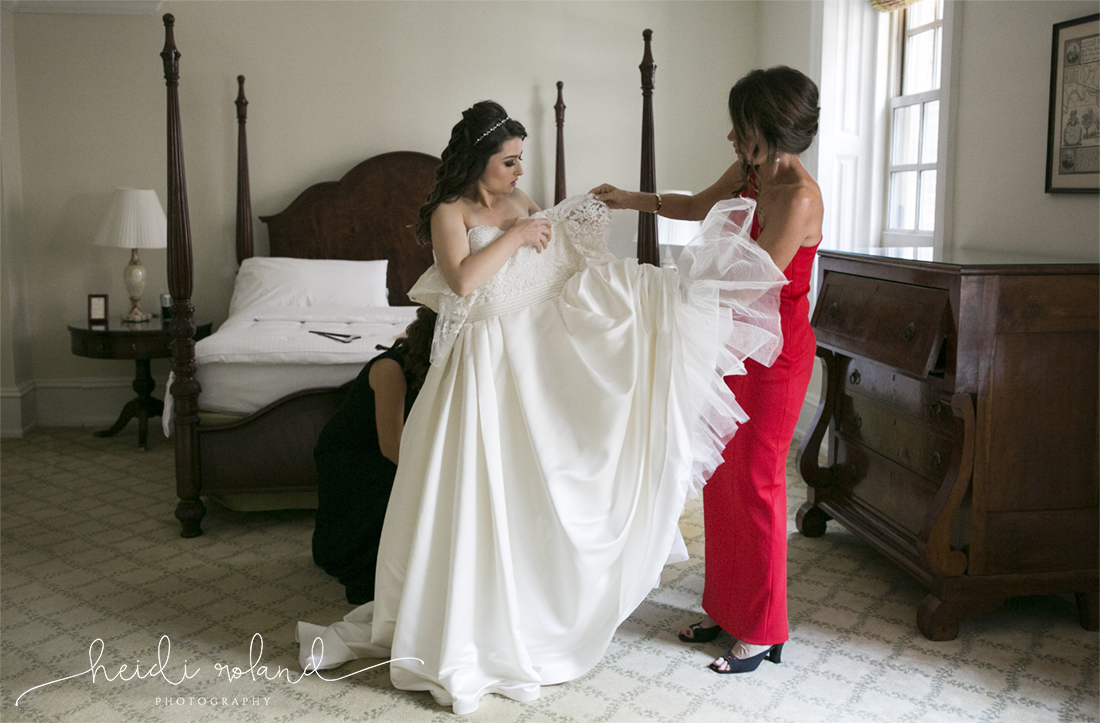 Racquet Club Of Philadelphia Wedding Bride putting on wedding dress