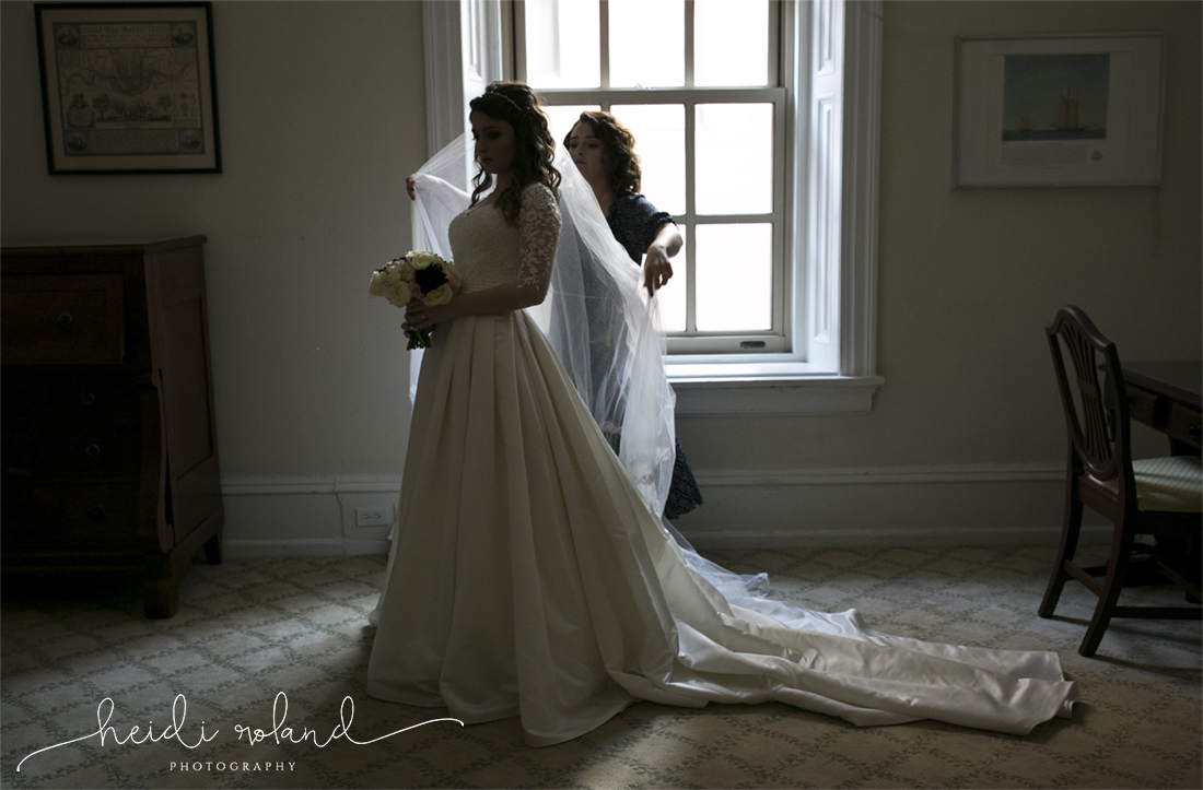 Racquet Club Of Philadelphia Wedding sister putting on bride's veil 