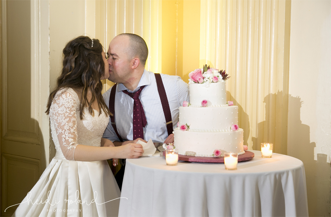 Racquet Club Of Philadelphia Wedding cake cutting kiss bride and groom