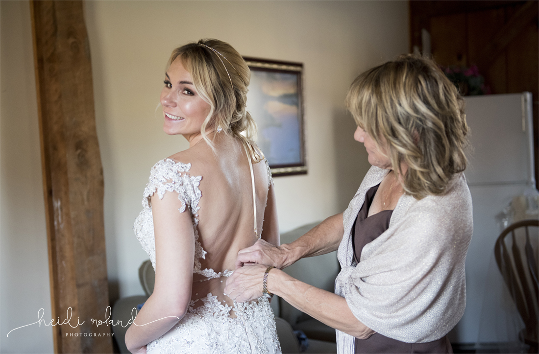 Heidi Roland Photography, Rustic Fall Wedding, bride getting in her wedding dress