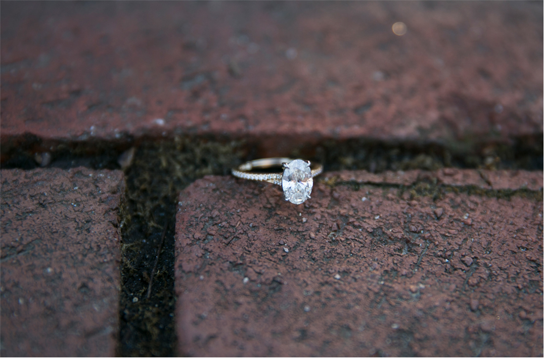 engagement ring on bricks