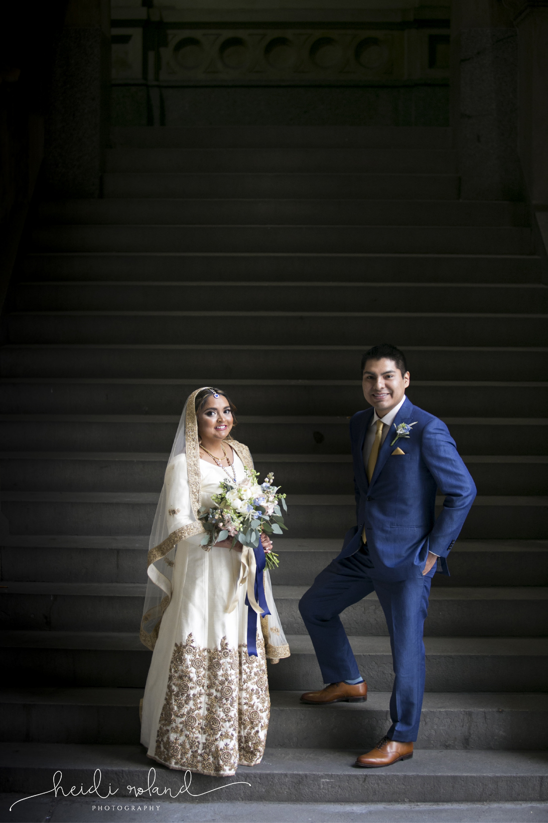 Philadelphia City Hall Indian interfaith Wedding, bride and groom portraits, blue suit, cream dress