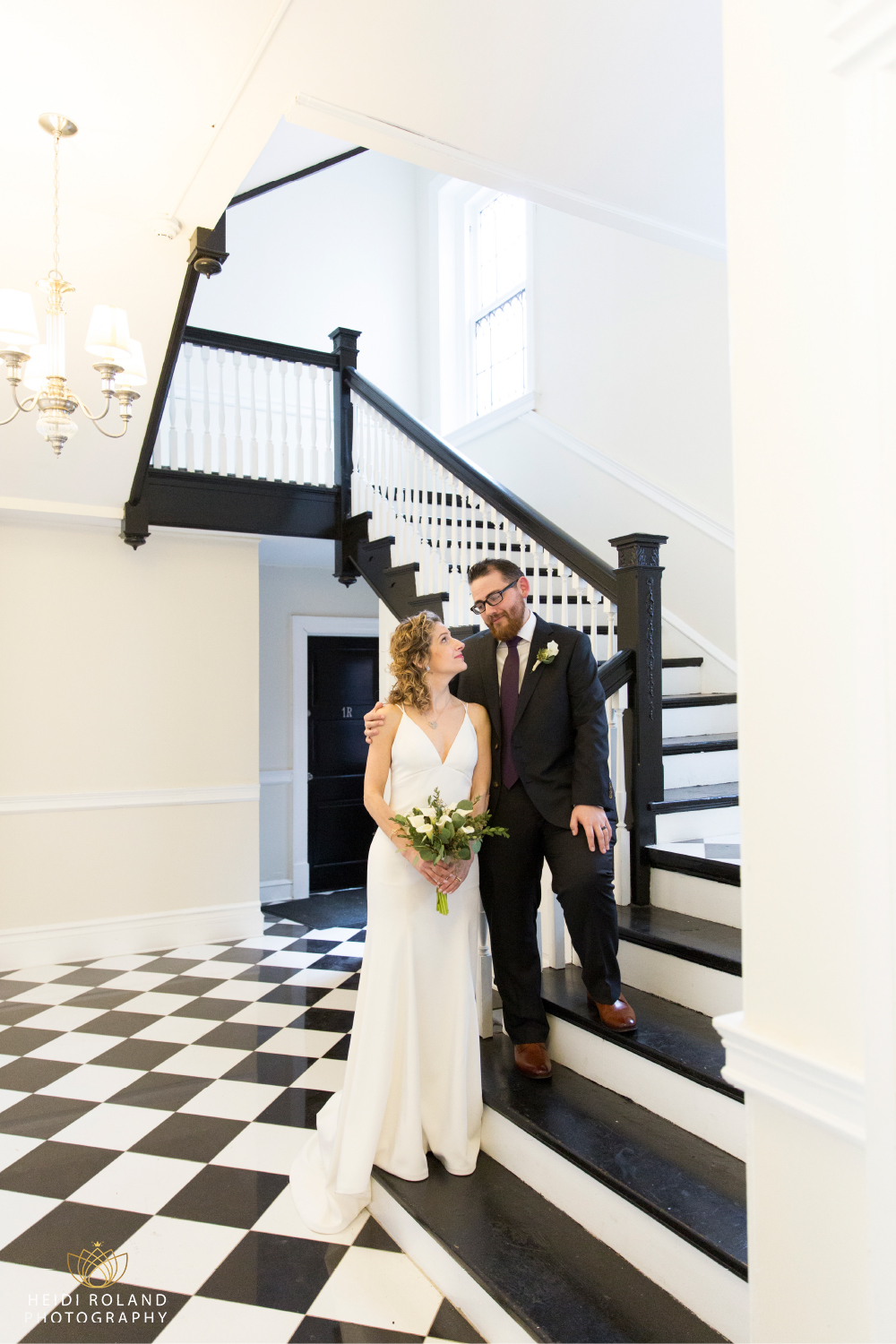 bride and groom photos in the lobby of Vaux wedding venue