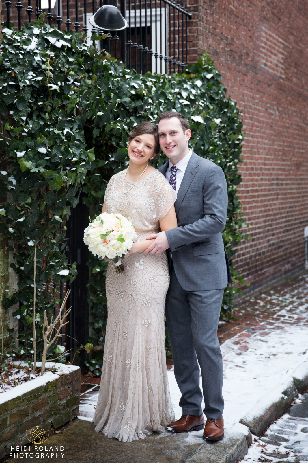 snow wedding photos of bride and groom in Philadelphia