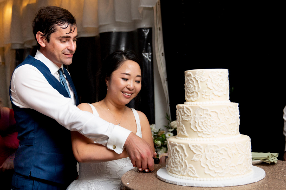Bride and groom cutting Bredenbeck’s cake Philadelphia