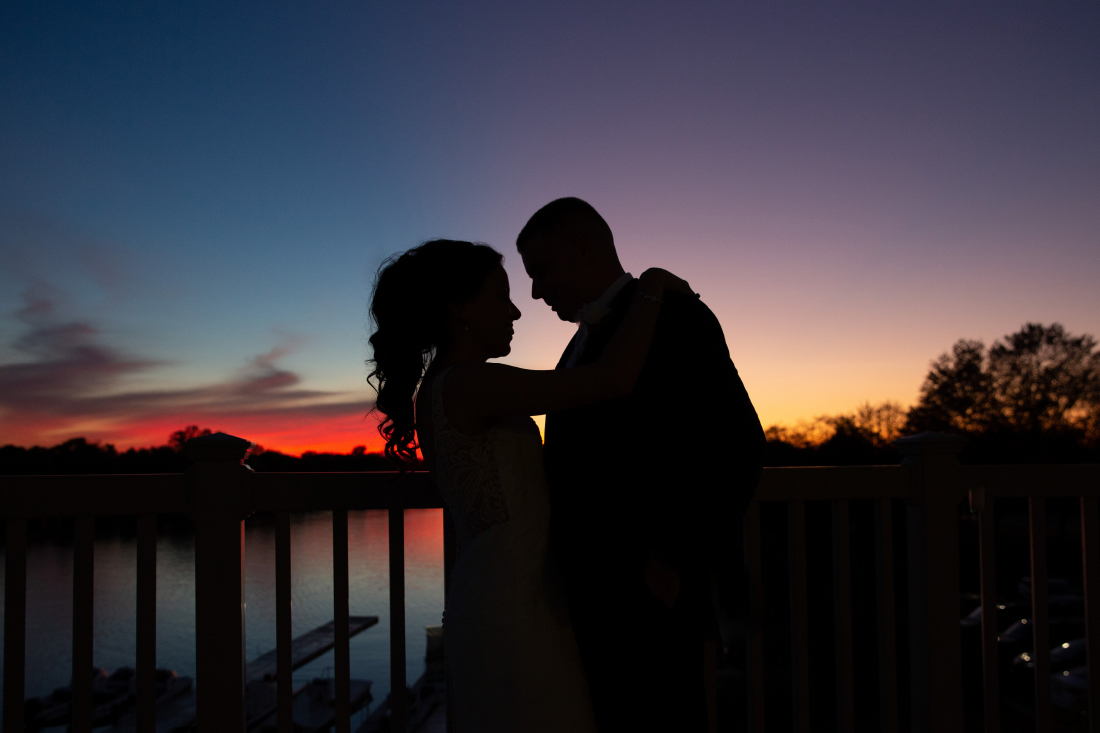 sunset photos of bride and groom Camden County Boathouse 