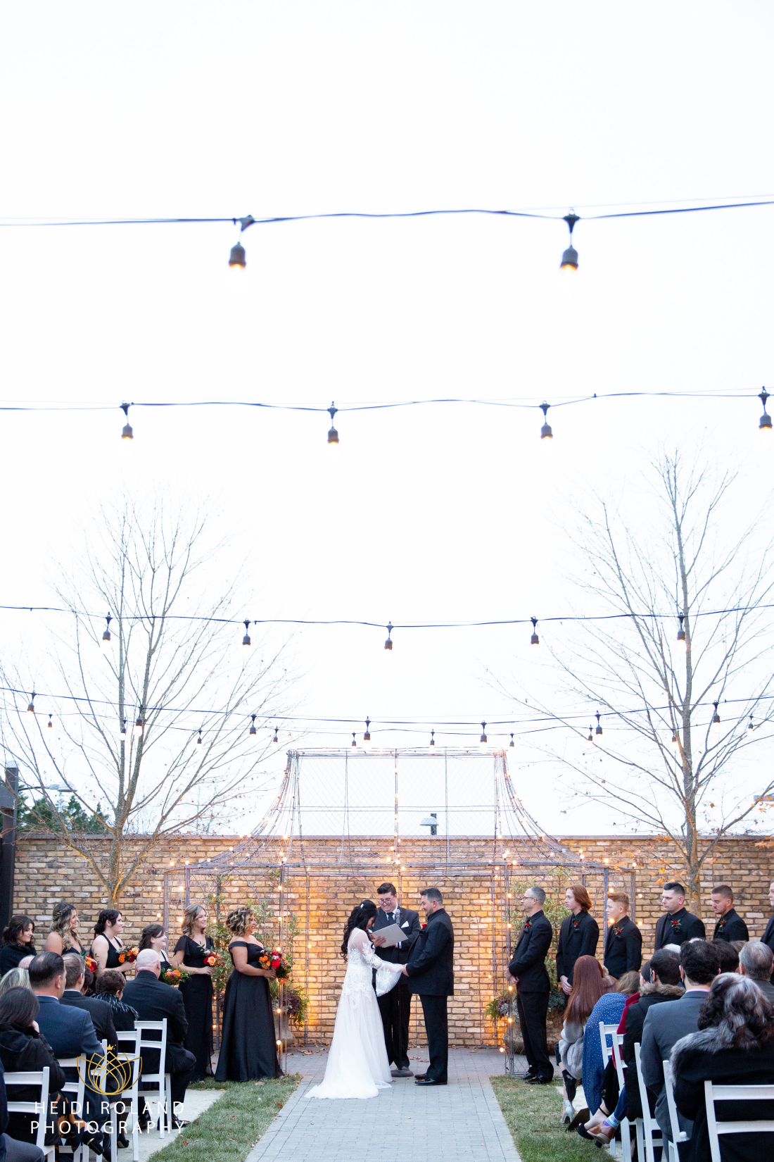 bride and groom saying their vows at Terrain winter wedding 