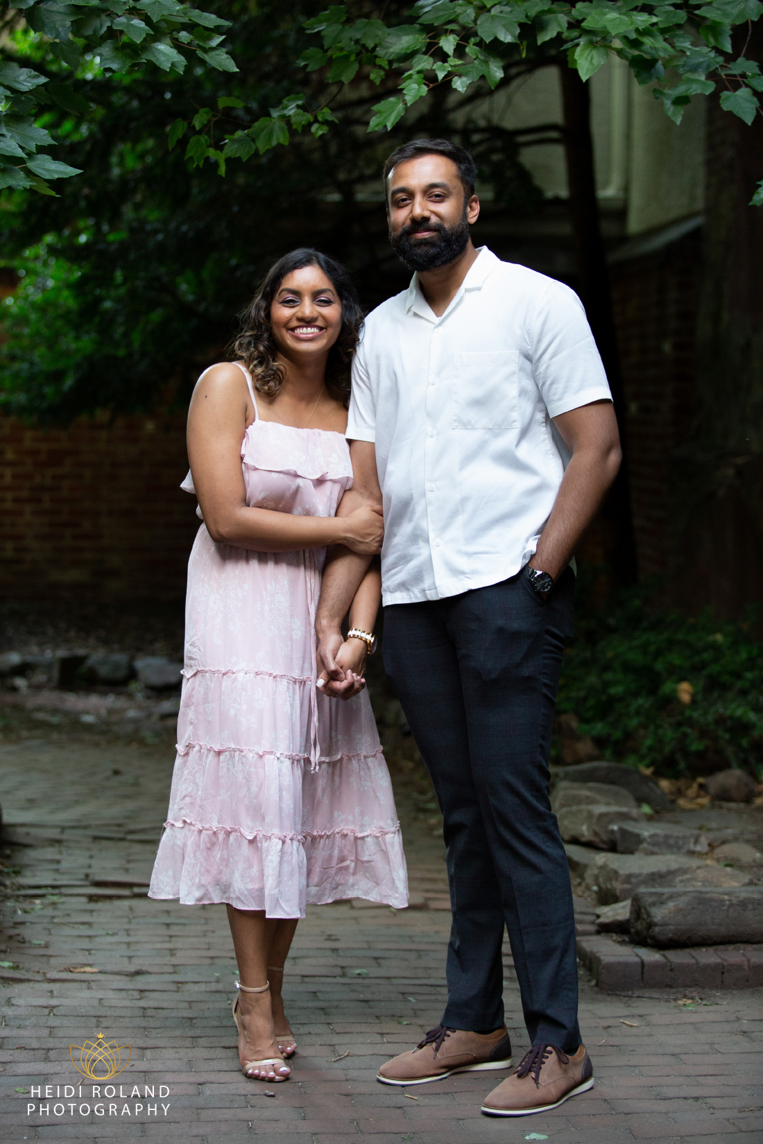 newly engaged couple in Old City Philadelphia courtyard