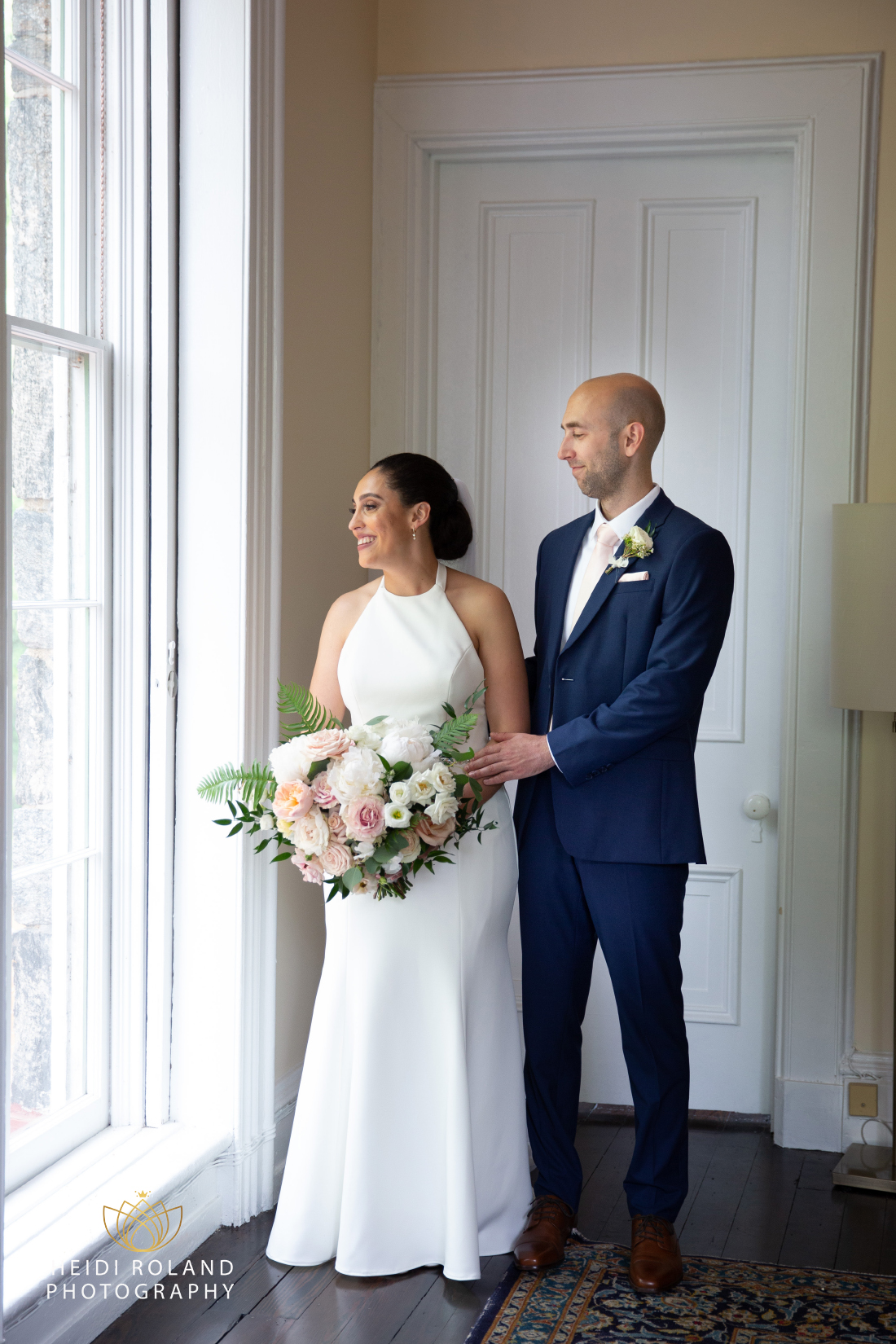 Bride and groom indoors before wedding at Awbury Arboretum 