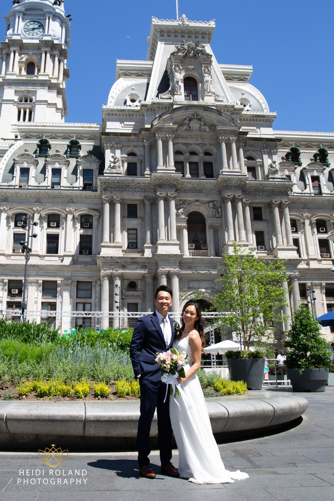 Philly bride and groom outside of City Hall by Heidi Roland Photography