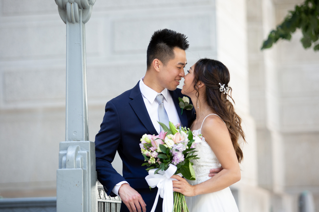 Bride and Groom outside City Hall in Philadelphia on their wedding day