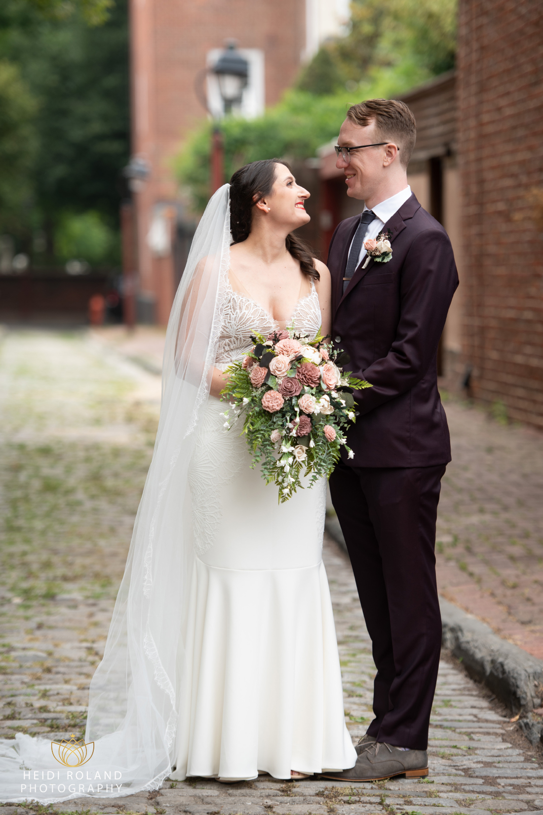 bride and groom on cobblestone Streets in Old City Philadelphia