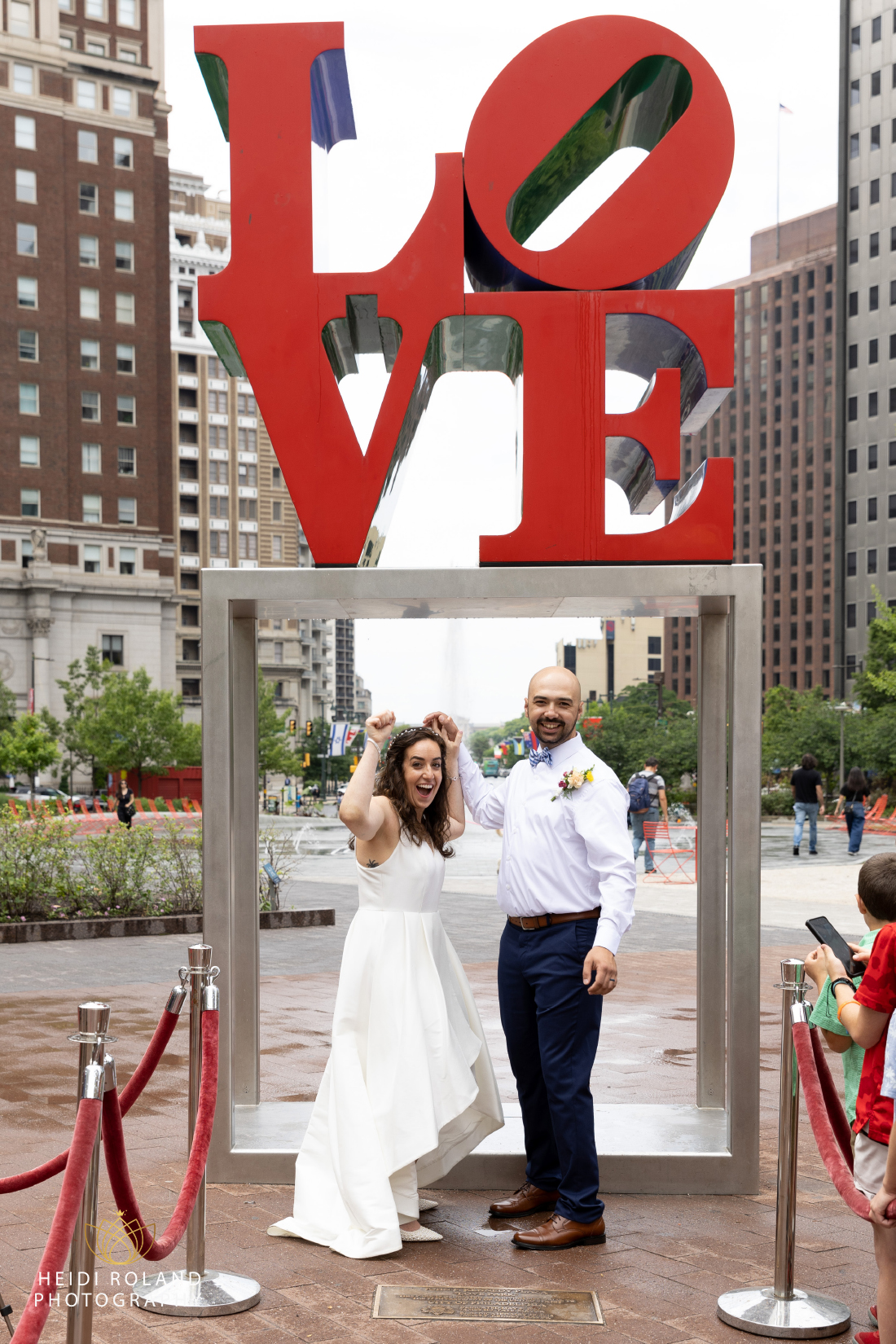 Bride and groom just married at Love Park philly