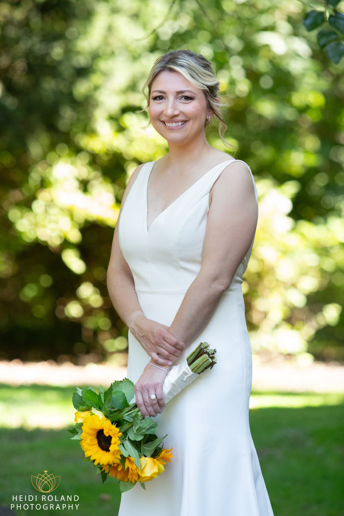 smiling bride with sunflowers