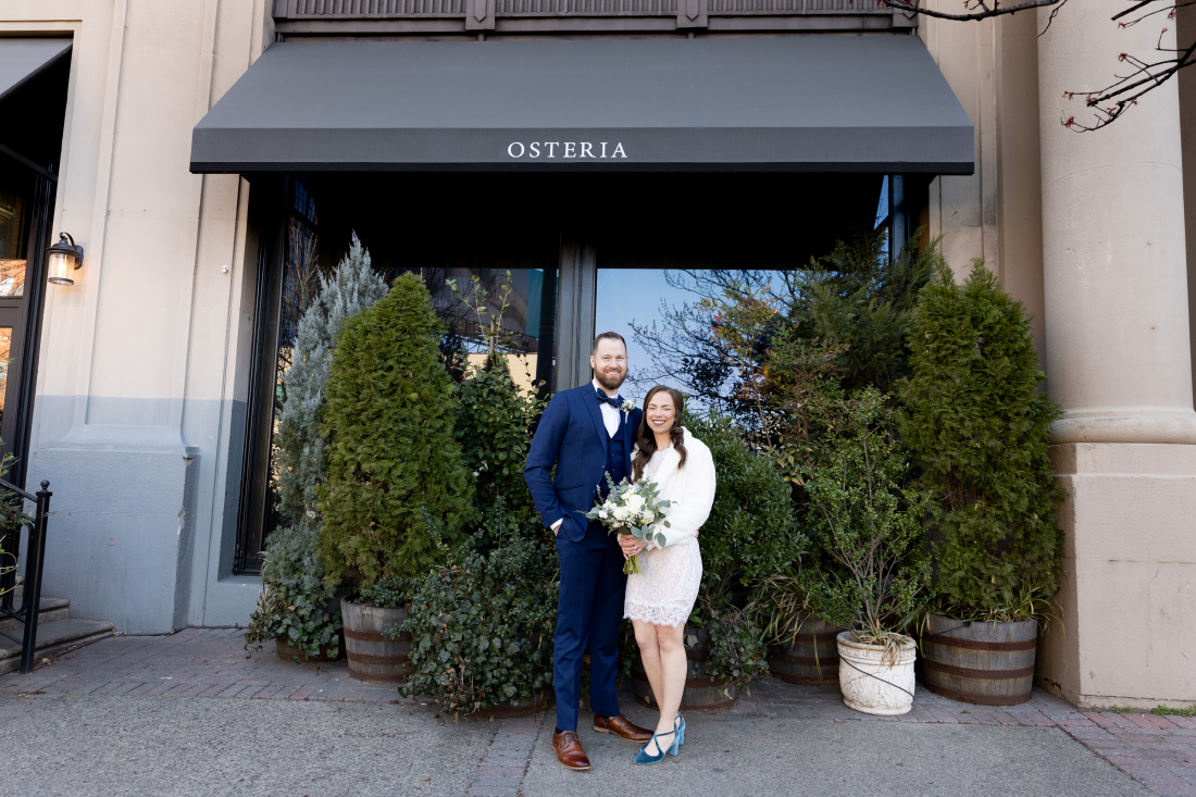 bride and groom outside Osteria Italian Restaurant 
