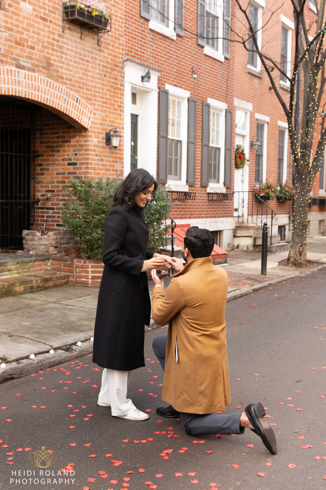 man on one knee for marriage proposal on Philadelphia's prettiest street