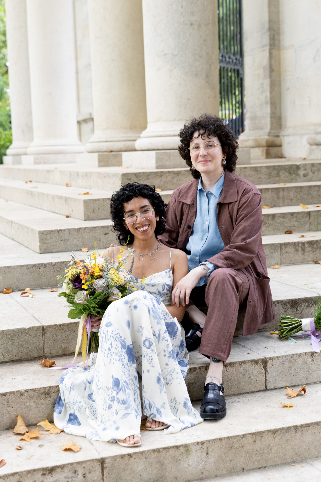 brides sitting on steps