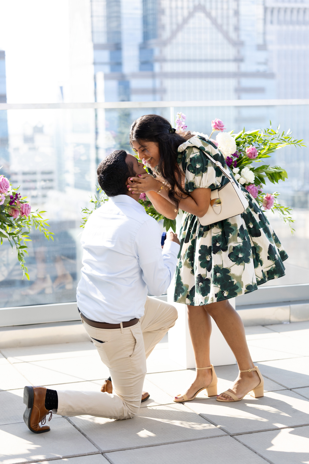 couple kisses during engagement photos