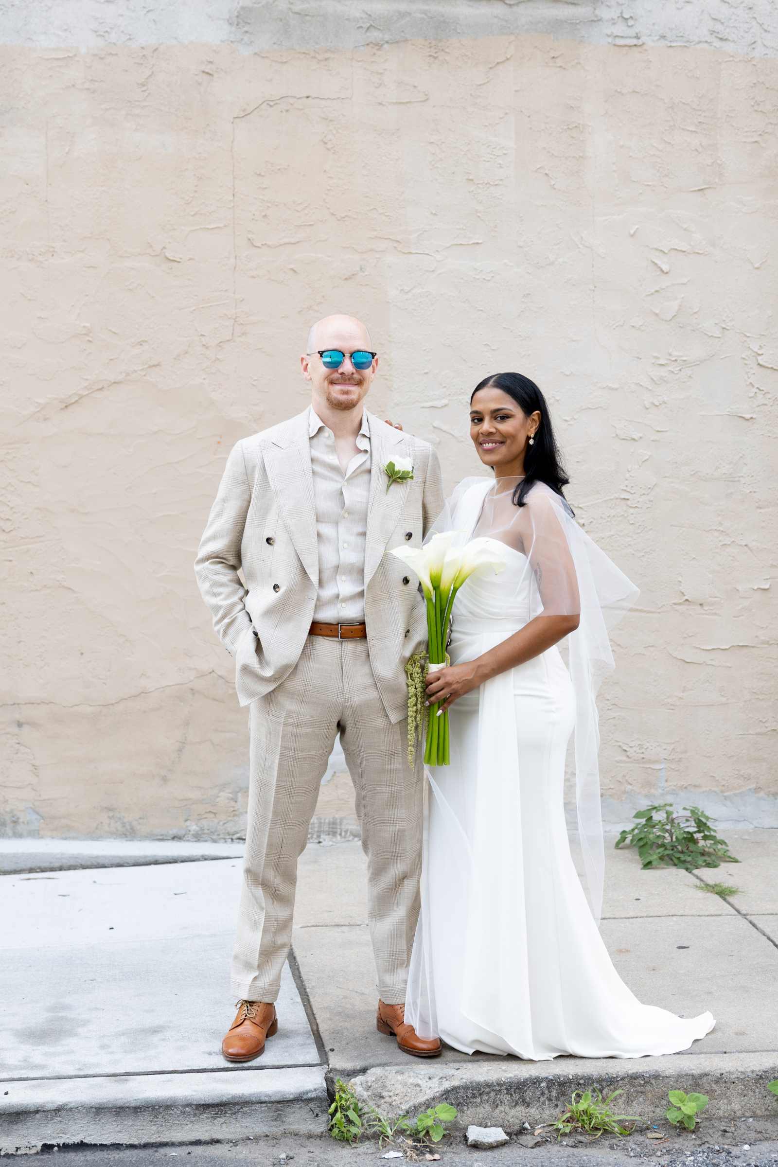 bride and groom on Philadelphia Street in the summer