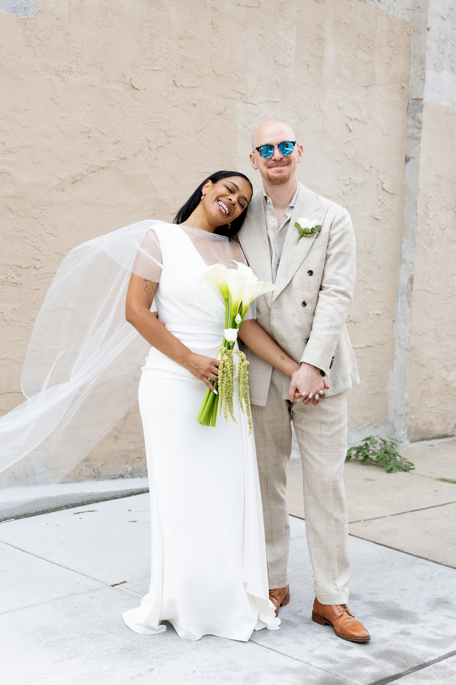 bride adn groom fun wedding photos on philly street