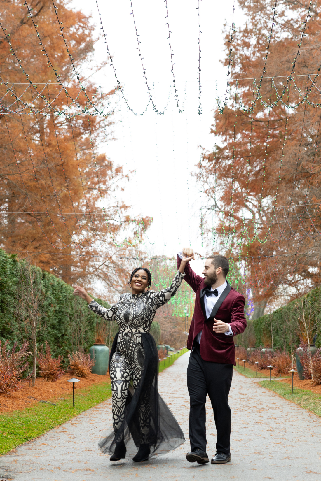 couple celebrating at their engagement session