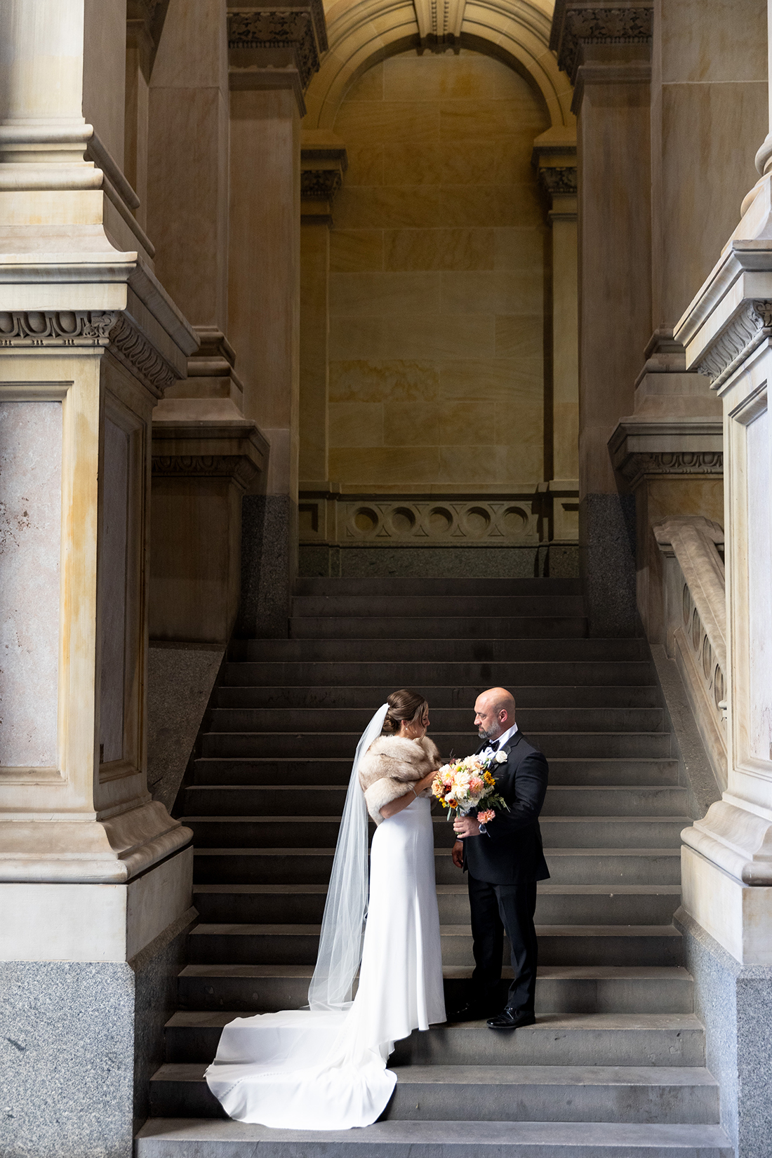 Bride and Groom In The Arches at Philadelphia City Hall 