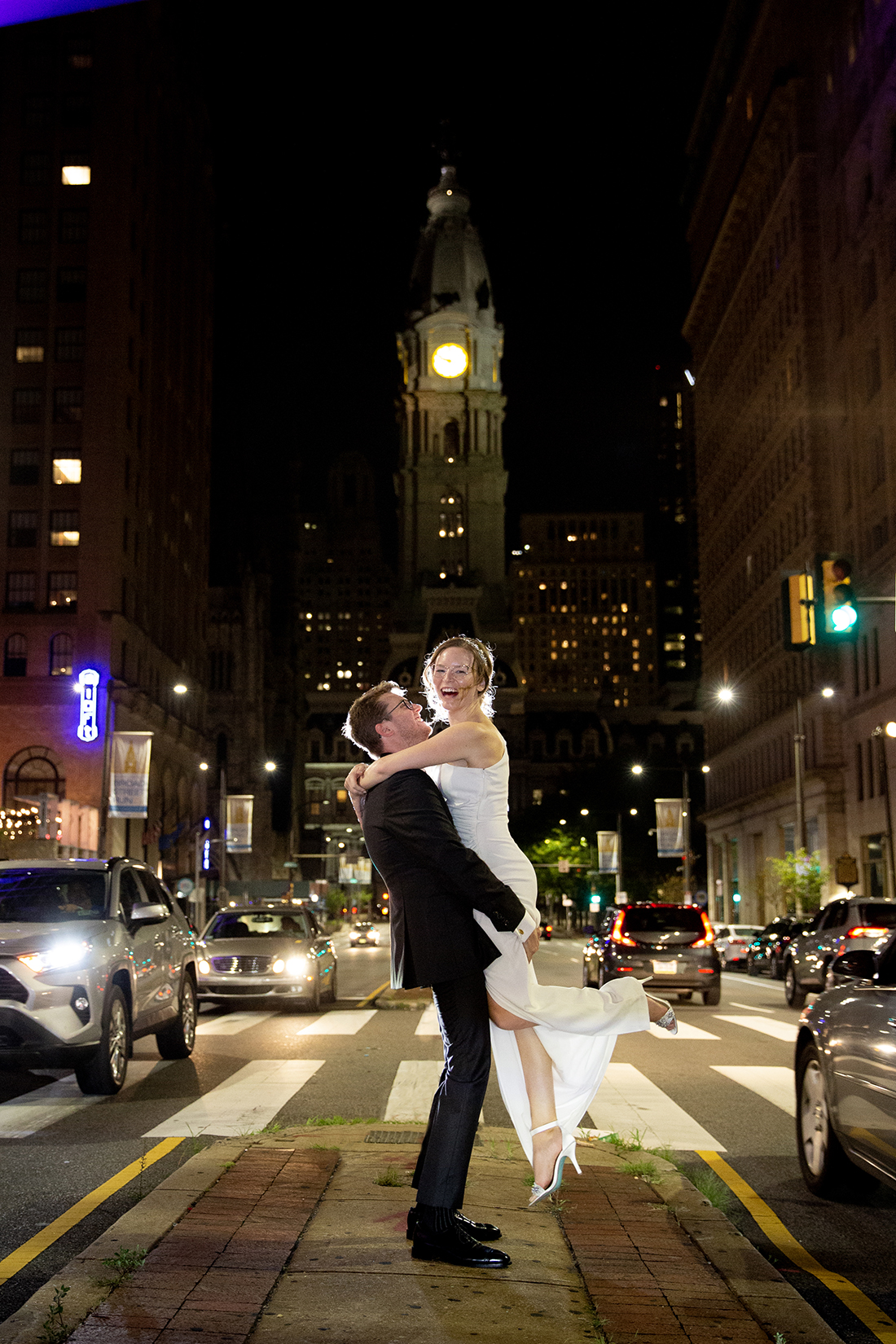 Wedding photo on Broad Street in Philadelphia at night