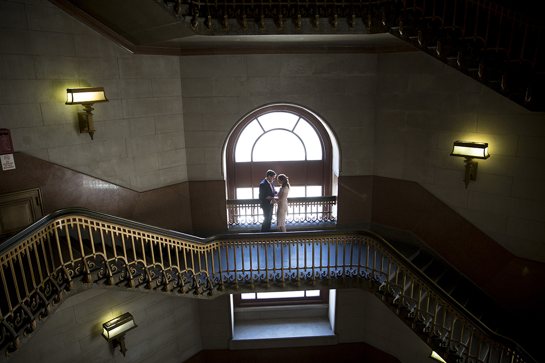 Bride and groom photos on the Staircase inside Philadelphia City Hall