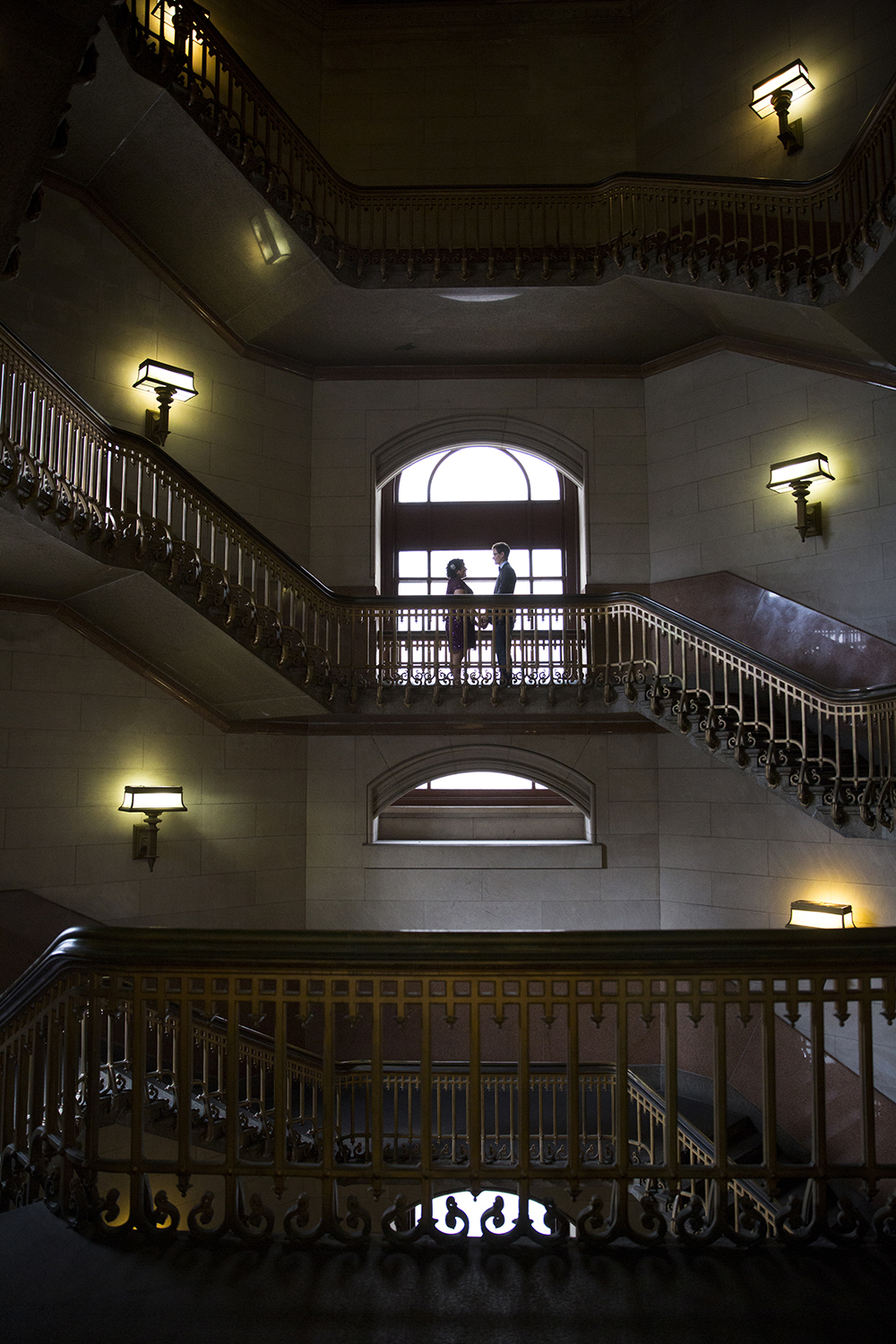 wedding photos on the inside staircase of Philadelphia City Hall