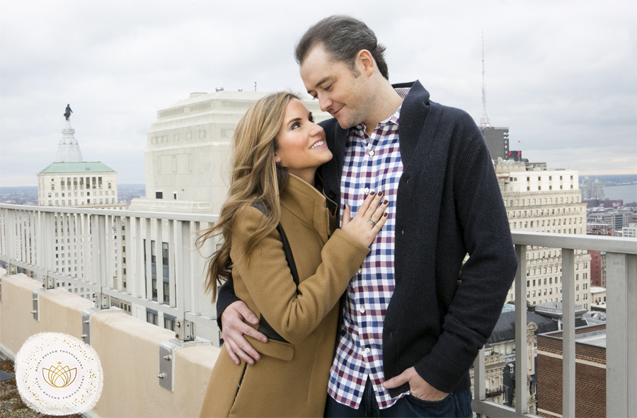 holiday engagement session, city hall philadelphia, laughing couple portrait, winter portrait, heidi roland photography , happy couple , rooftop view