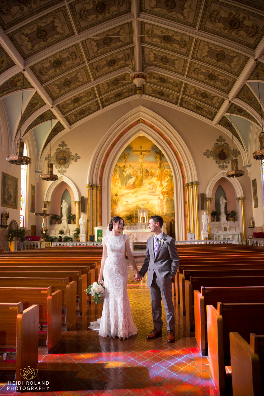 bride and groom portraits at Pauls Catholic church Philadelphia