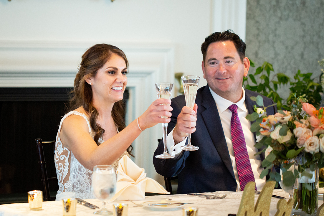 Champagne wedding toasts Saucon Valley Country Club ballroom wedding reception 
