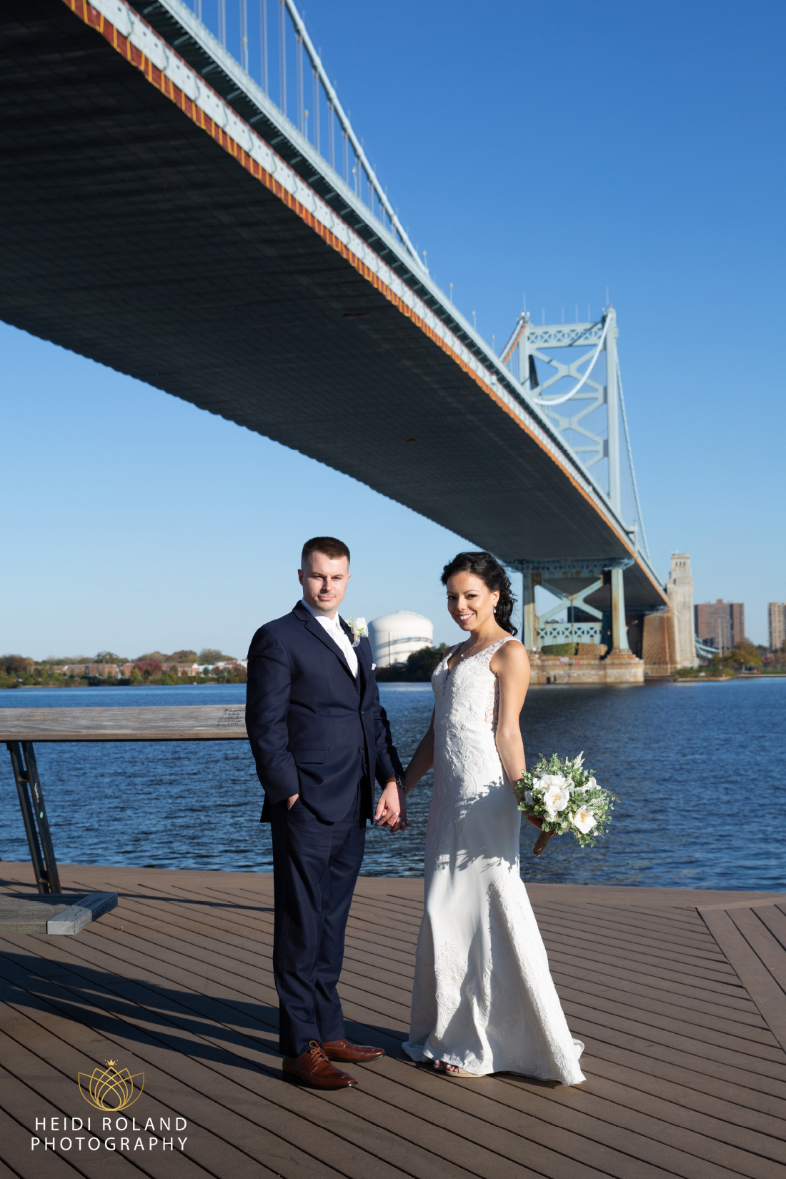 couple on wedding day at Race Street Pier
