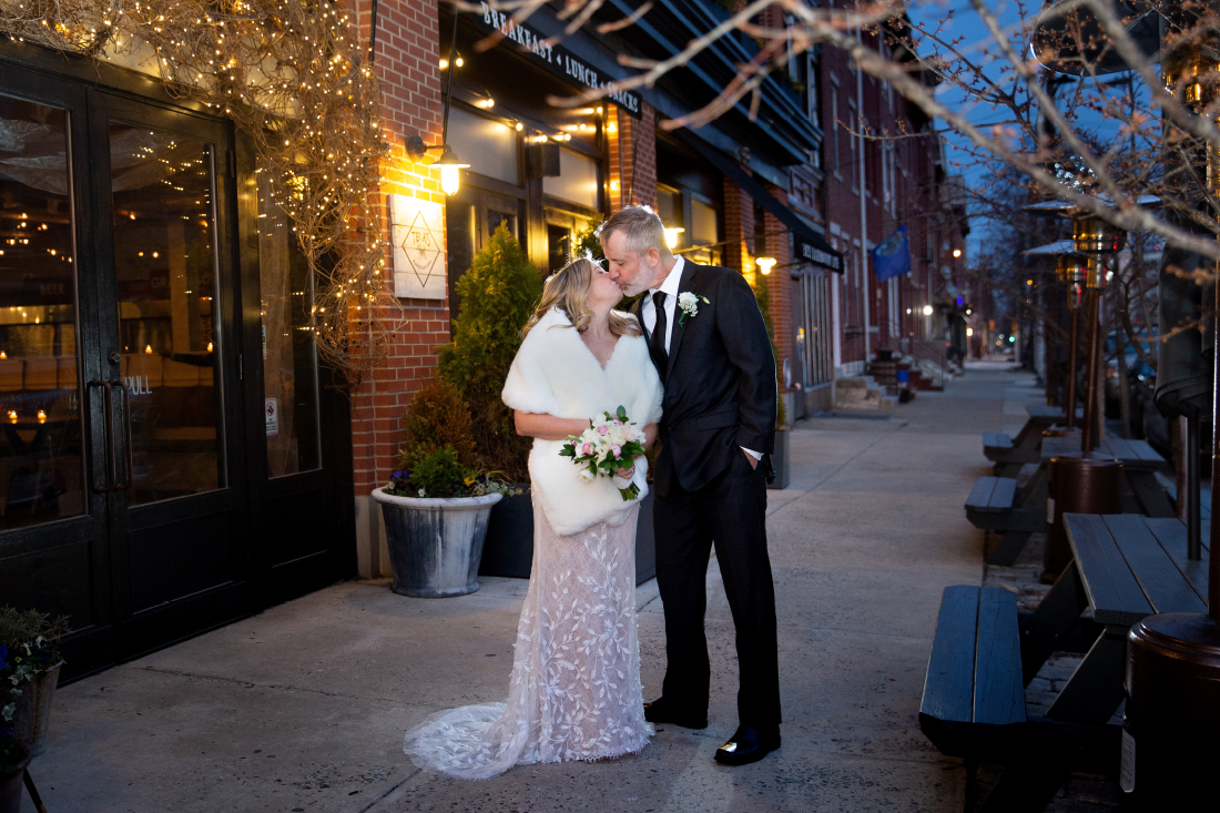 bride and groom evening photo on philly street
