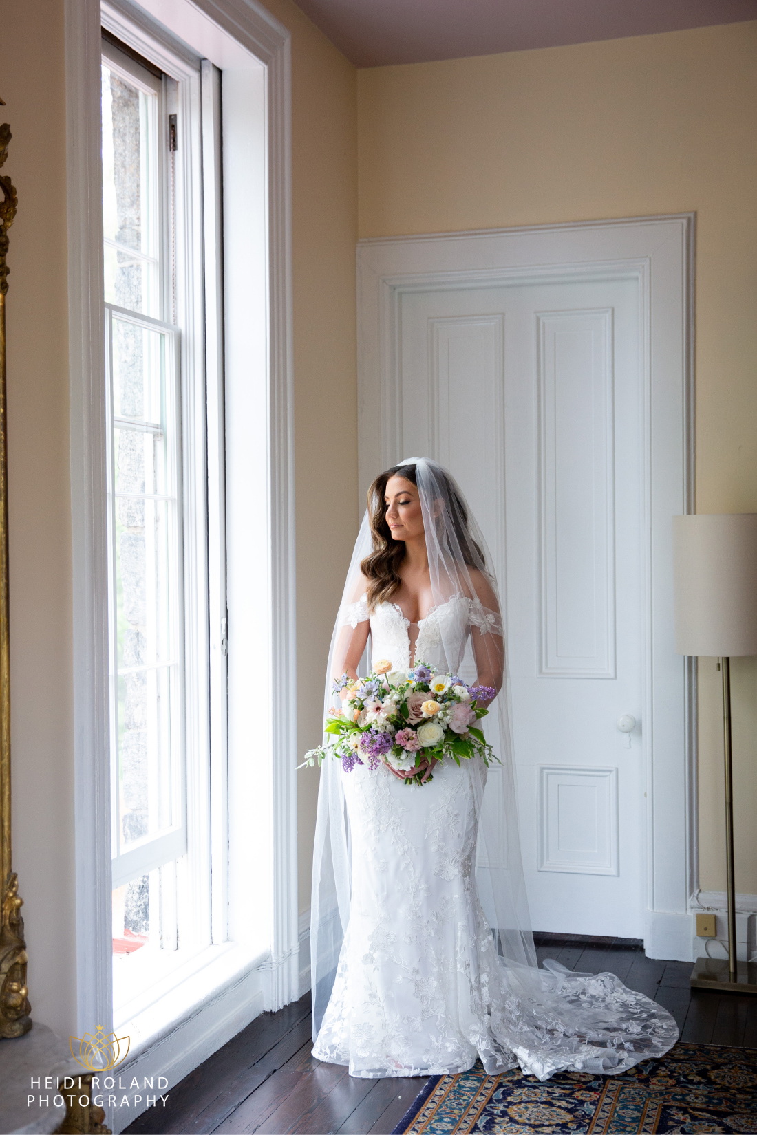 bridal portait with spring flowers by window