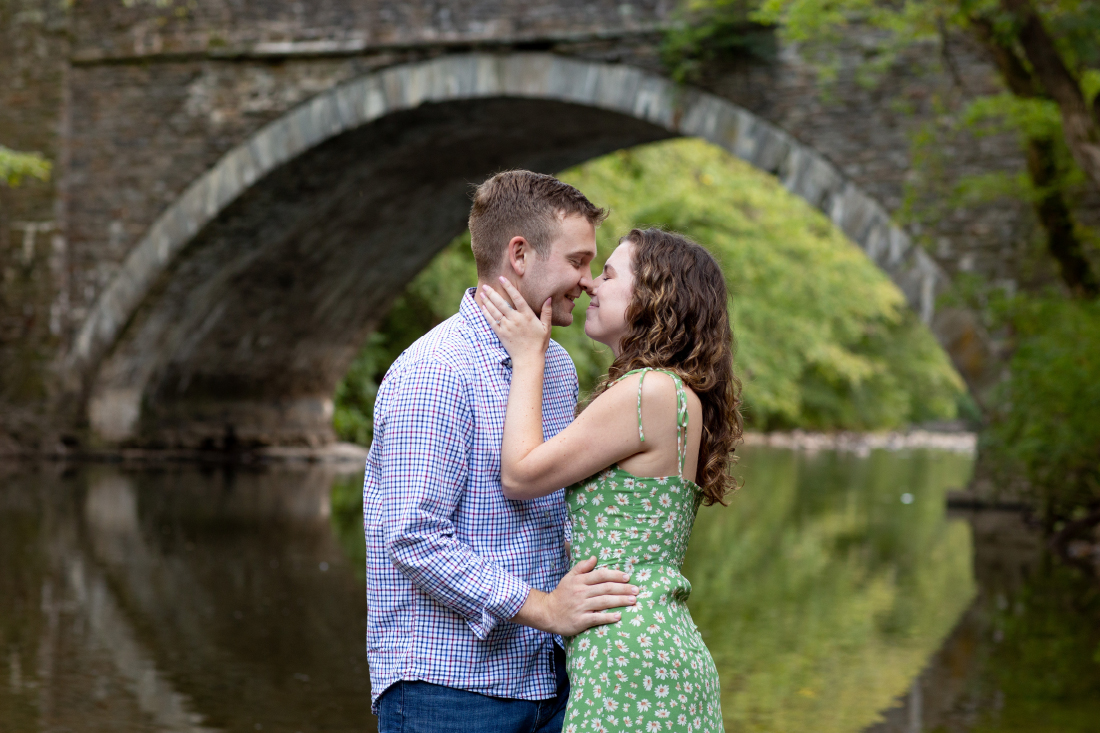  Engagement Photos couple in by the Wissahickon creek Philadelphia 