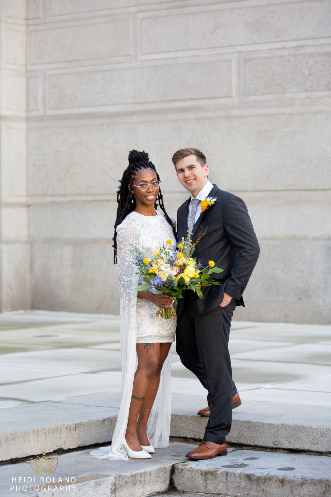 Bride and groom on City Hall Steps in Philadelphia