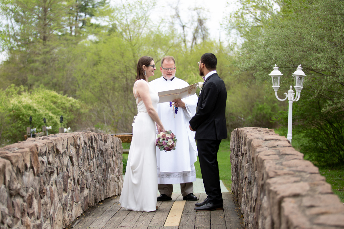 Elopement photos at Prophecy Creek Park on bridge