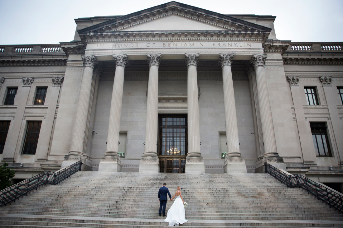 bride and groom on front steps at The Franklin Institute Wedding Philadelphia